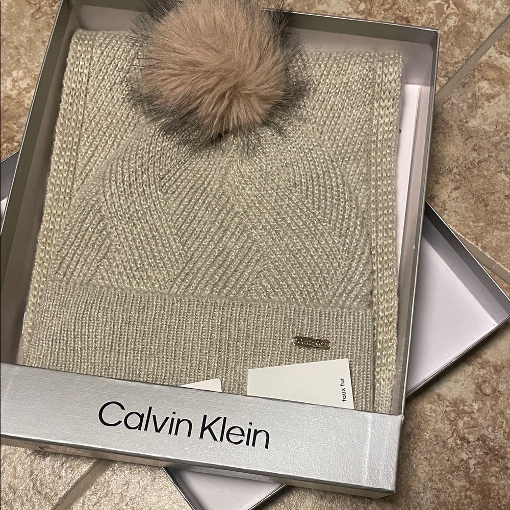New!! Calvin Klein gold Knit Beanie with Pom Pom and matching scarf.